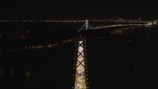 DCSF06_031 - 5K aerial stock footage Follow Bay Bridge, approach Yerba Buena Island, San Francisco, California, night
