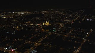 DCSF06_050 - 5K aerial stock footage Tilt to reveal St. Ignatius Church, Inner Richmond District, San Francisco, California, night