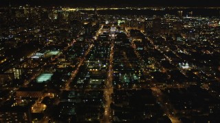 DCSF06_055 - 5K aerial stock footage Tilt from Fulton Street to reveal San Francisco City Hall, Civic Center, San Francisco, California, night