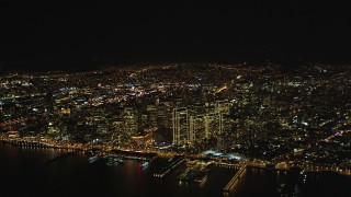 DCSF06_071 - 5K aerial stock footage High altitude view of Downtown San Francisco, California, seen from San Francisco Bay at night