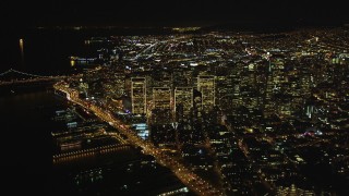 DCSF06_073 - 5K aerial stock footage High altitude view of Downtown San Francisco at night seen from North Beach, California