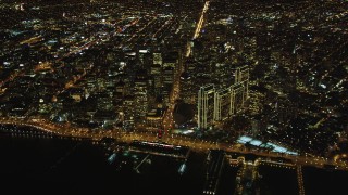 DCSF06_082 - 5K aerial stock footage High altitude view of Ferry Building, Market Street, The Embarcadero, Downtown San Francisco, California, night