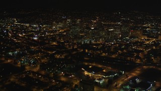 DCSF06_092 - 5K aerial stock footage Fly over I-980 to approach Downtown Oakland, California, night