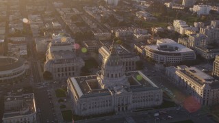 DCSF07_019 - 5K aerial stock footage Orbiting San Francisco City Hall, Civic Center, San Francisco, California, sunset