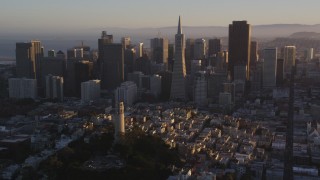 DCSF07_030 - 5K aerial stock footage Flyby Coit Tower, Transamerica Pyramid and Downtown San Francisco, California, sunset