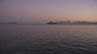 DCSF07_083 - Aerial stock footage of 5K Aerial Video Low altitude approach to Alcatraz, San Francisco, California, twilight
