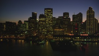 DCSF07_110 - Aerial stock footage of 5K Aerial Video Passing by the Ferry Building and skyline of Downtown San Francisco, California, twilight