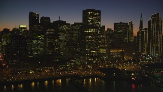 DCSF07_111 - Aerial stock footage of 5K Aerial Video Fly by downtown skyline and reveal Ferry Building, Downtown San Francisco, California, twilight