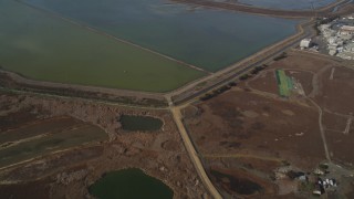 DCSF08_005 - Aerial stock footage of 5K Aerial Video Reverse view of sloughs in Union City, California