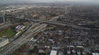 DCSF09_005 - Aerial stock footage of 5K Aerial Video Flying by freeway interchange by Downtown San Jose, California