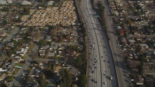DCSF09_011 - Aerial stock footage of 5K Aerial Video Reverse view of light traffic on Interstate 280, San Jose, California