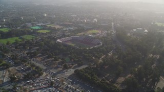 DCSF09_019 - Aerial stock footage of 5K Aerial Video Reverse view of Stanford Stadium, pan across campus of Stanford University, Stanford, California