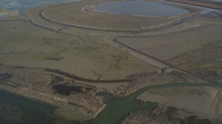DCSF09_031 - Aerial stock footage of 5K Aerial Video Flying away from marshland, Hayward, California