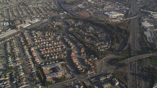 DCSF09_034 - Aerial stock footage of 5K Aerial Video Reverse view of residential neighborhoods by I-880, San Leandro, California