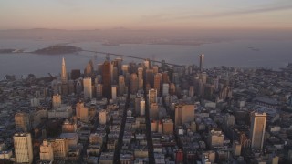 DCSF10_014 - Aerial stock footage of 5K Aerial Video Reverse view of Downtown San Francisco and San Francisco Bay, California, twilight
