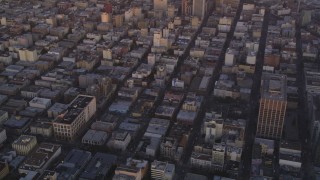 DCSF10_017 - Aerial stock footage of 5K Aerial Video Tilt from Civic Center to reveal Downtown San Francisco, California, twilight