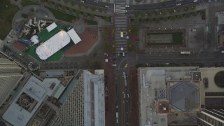 DCSF10_020 - Aerial stock footage of 5K Aerial Video Bird's eye view of Market Street, reveal Justin Herman Plaza and Ferry Buildings, Downtown San Francisco, California, sunset