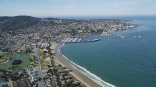 DCSF11_001 - Aerial stock footage of 5K Aerial Video Tilt from US Naval Postgraduate School to reveal Monterey State Beach and Monterey, California