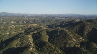DCSF12_002 - Aerial stock footage of 5K Aerial Video Approach power lines atop hills, San Luis Obispo County, California