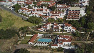 DFKSF01_022 - 5K aerial stock footage of flying by the Ojai Valley Inn and Spa hotel in Ojai, California