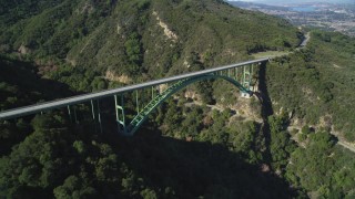 DFKSF01_048 - 5K aerial stock footage of approaching the Cold Springs Canyon Arch Bridge, Santa Ynez Mountains, California