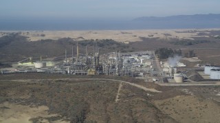 DFKSF02_017 - 5K stock footage aerial video of approaching Phillips 66 Company Santa Maria Refinery, Arroyo Grande, California