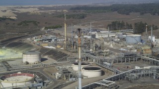 DFKSF02_018 - 5K aerial stock footage of flying by the Phillips 66 Company Santa Maria Refinery, Arroyo Grande, California