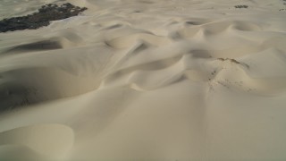 DFKSF02_023 - 5K aerial stock footage video of flying over the sand dunes, Pismo Dunes, California