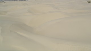 DFKSF02_026 - 5K aerial stock footage of flying over sand dunes, Pismo Dunes, California