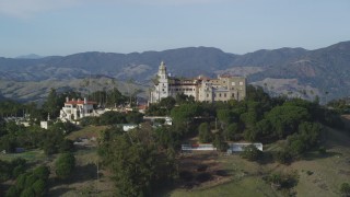 DFKSF03_063 - 5K aerial stock footage of flying by Hearst Castle, San Simeon, California