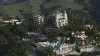 DFKSF03_068 - 5K aerial stock footage of orbiting the Neptune Pool, west side of iconic Hearst Castle, San Simeon, California