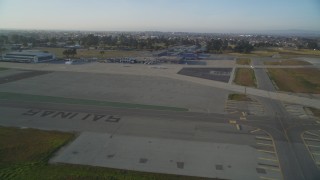 DFKSF03_140 - 5K aerial stock footage of landing at the Salinas Municipal Airport, Salinas, California