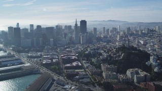 DFKSF05_023 - 5K aerial stock footage of skyscrapers and Coit Tower in North Beach, Downtown San Francisco, California