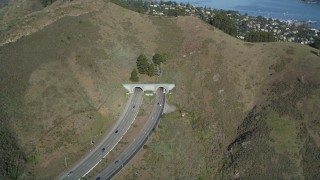 DFKSF05_054 - 5K stock footage aerial video of the Robin Williams Tunnel (Waldo Tunnel), Marin Hills, Sausalito, California