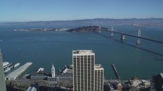 DFKSF05_085 - 5K aerial stock footage approach Bay Bridge, Yerba Buena Island, Treasure Island, San Francisco, California