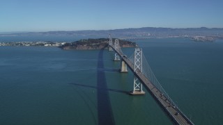 DFKSF05_087 - 5K aerial stock footage flyby Bay Bridge, view of Yerba Buena, Treasure Islands in San Francisco, California