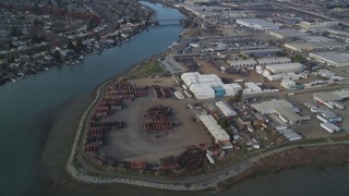 DFKSF06_001 - 5K aerial stock footage fly over warehouses besides the Oakland Estuary, Oakland, California