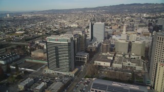 DFKSF06_011 - 5K aerial stock footage flyby city hall, federal and office buildings, revealing I-980 freeway, Downtown Oakland, California