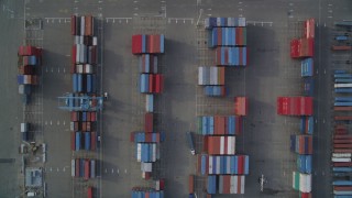 DFKSF06_016 - 5K aerial stock footage of bird's eye view of Port of Oakland shipping containers, California