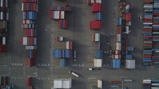 DFKSF06_017 - 5K aerial stock footage of a bird's eye view of Port of Oakland shipping containers, California