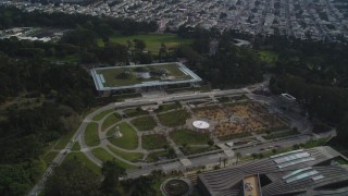 DFKSF06_058 - 5K aerial stock footage an orbit of the California Academy of Sciences in iconic Golden Gate Park, San Francisco, California