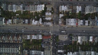 DFKSF06_069 - 5K stock footage aerial video of a bird's eye of row houses and streets in the Inner Sunset District, San Francisco, California