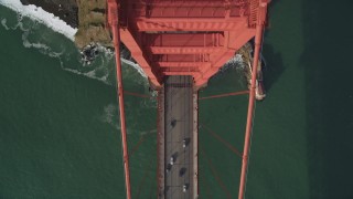 DFKSF06_091 - 5K stock footage aerial video of a bird's eye view of traffic on the Marin side of Golden Gate Bridge, San Francisco, California