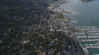 DFKSF06_095 - 5K stock footage aerial video of flying by the coastal community of Sausalito and marinas on Richardson Bay, Sausalito, California