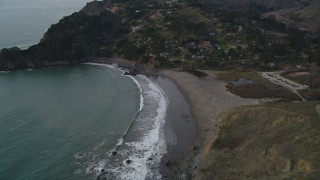 DFKSF06_103 - 5K aerial stock footage of flying by Muir Beach and hillside home on the coast, Marin County,  California