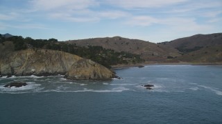 DFKSF06_105 - 5K stock footage aerial video of flying by coastal cliffs in Muir Beach, Marin County,  California