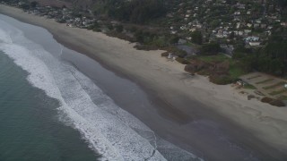 DFKSF06_114 - 5K aerial stock footage of flying by beachside homes, Stinson Beach, California