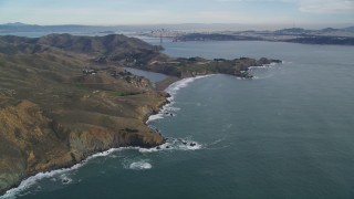 DFKSF06_154 - 5K stock footage aerial video of passing by Marin Headlands, San Francisco in the distance, Marin County, California