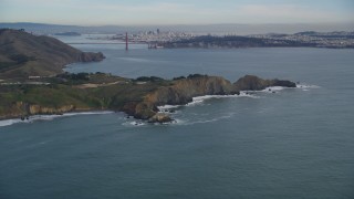 DFKSF06_155 - 5K aerial stock footage tilt from Marin Headlands revealing Golden Gate Bridge, San Francisco, California