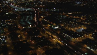 DFKSF07_084 - 5K stock footage aerial video of light traffic on I-880 freeway, Oakland, California, night